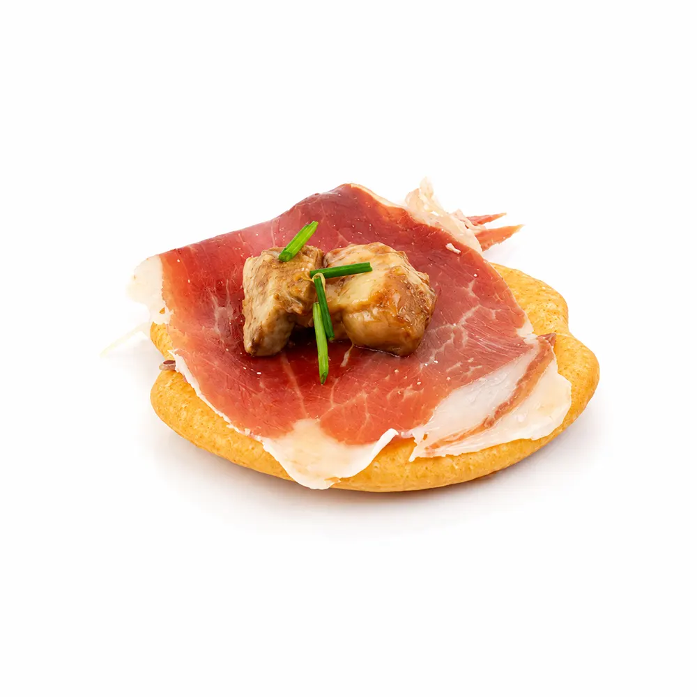 Canapé ibérico con jamón y bocado gourmet de Valumé Catering